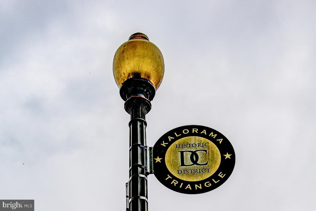 1910 Kalorama Road Northwest, Unit 403 Washington, DC 20009 - Photo 41 of 52 a picture of a sign of a house