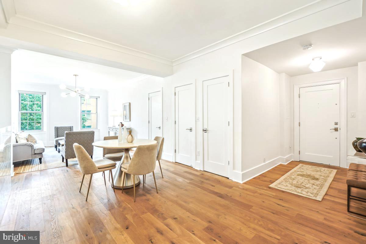 1910 Kalorama Road Northwest, Unit 403 Washington, DC 20009 - Photo 7 of 52 a view of a livingroom with furniture and wooden floor