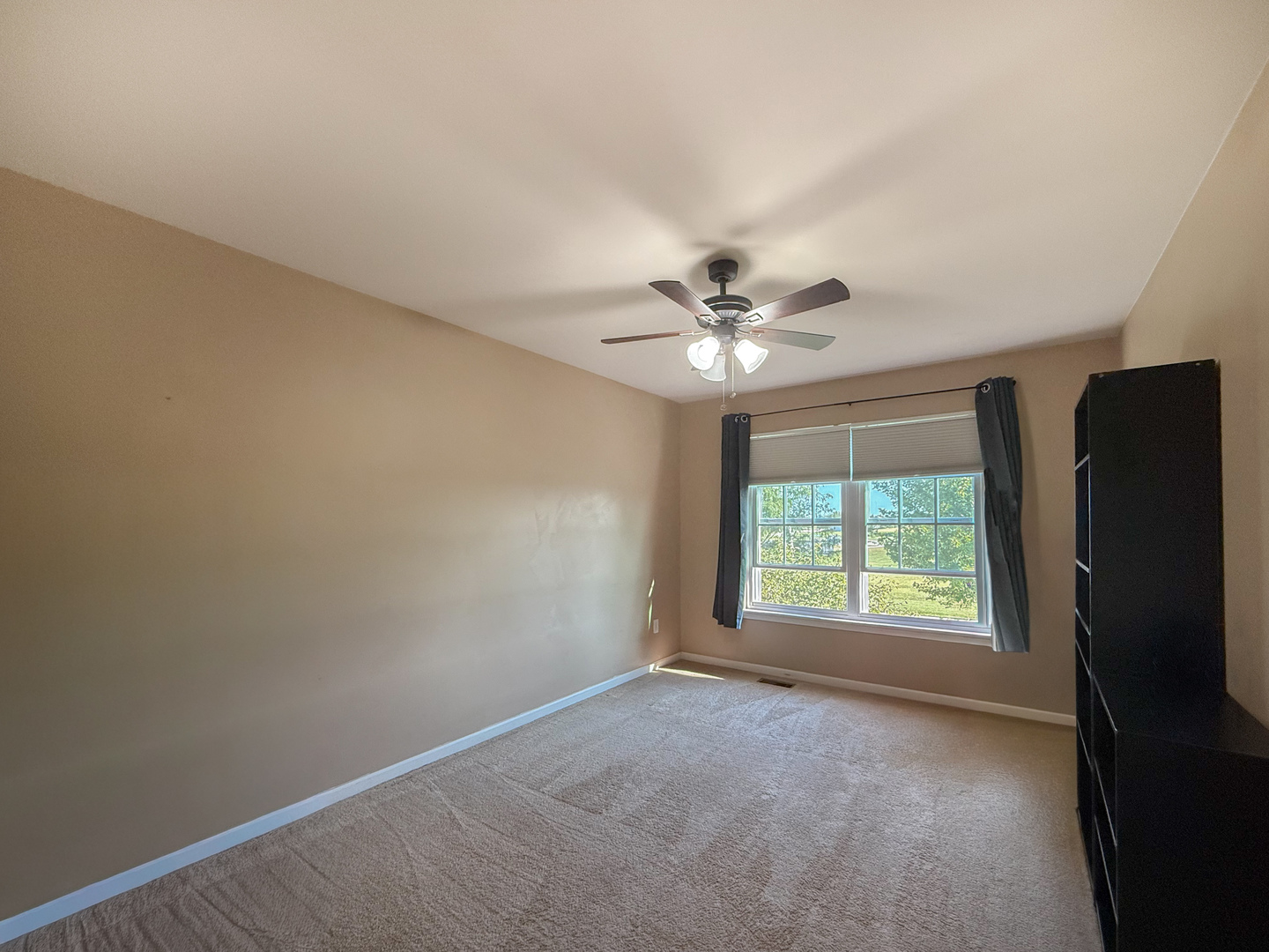 445 East Becker Place Sycamore, IL 60178 - Photo 17 of 27 a view of an empty room with a window