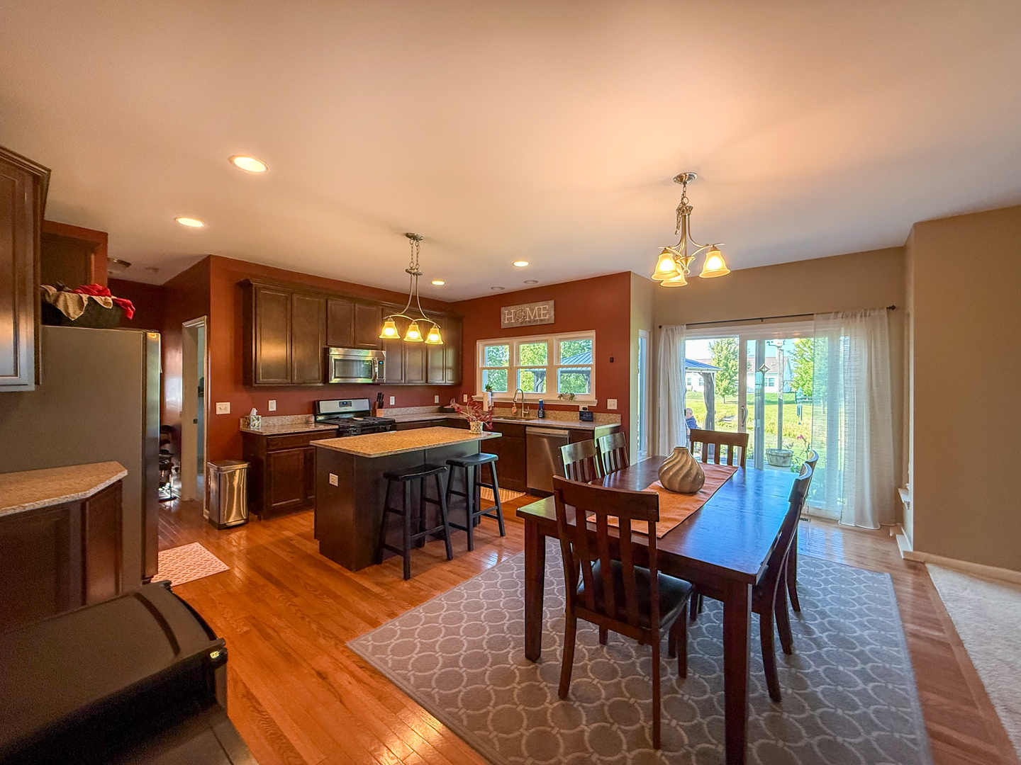 445 East Becker Place Sycamore, IL 60178 - Photo 7 of 27 a view of a dining room with furniture