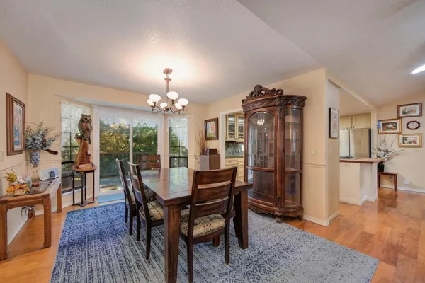 a kitchen with stainless steel appliances a stove sink microwave and cabinets