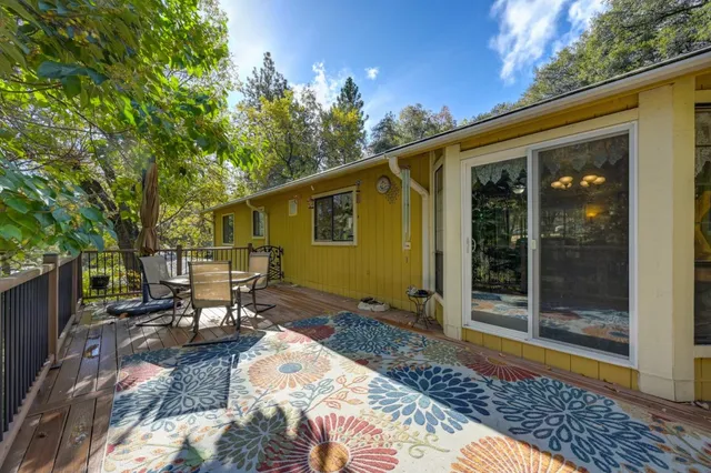 a view of outdoor space with trees all around