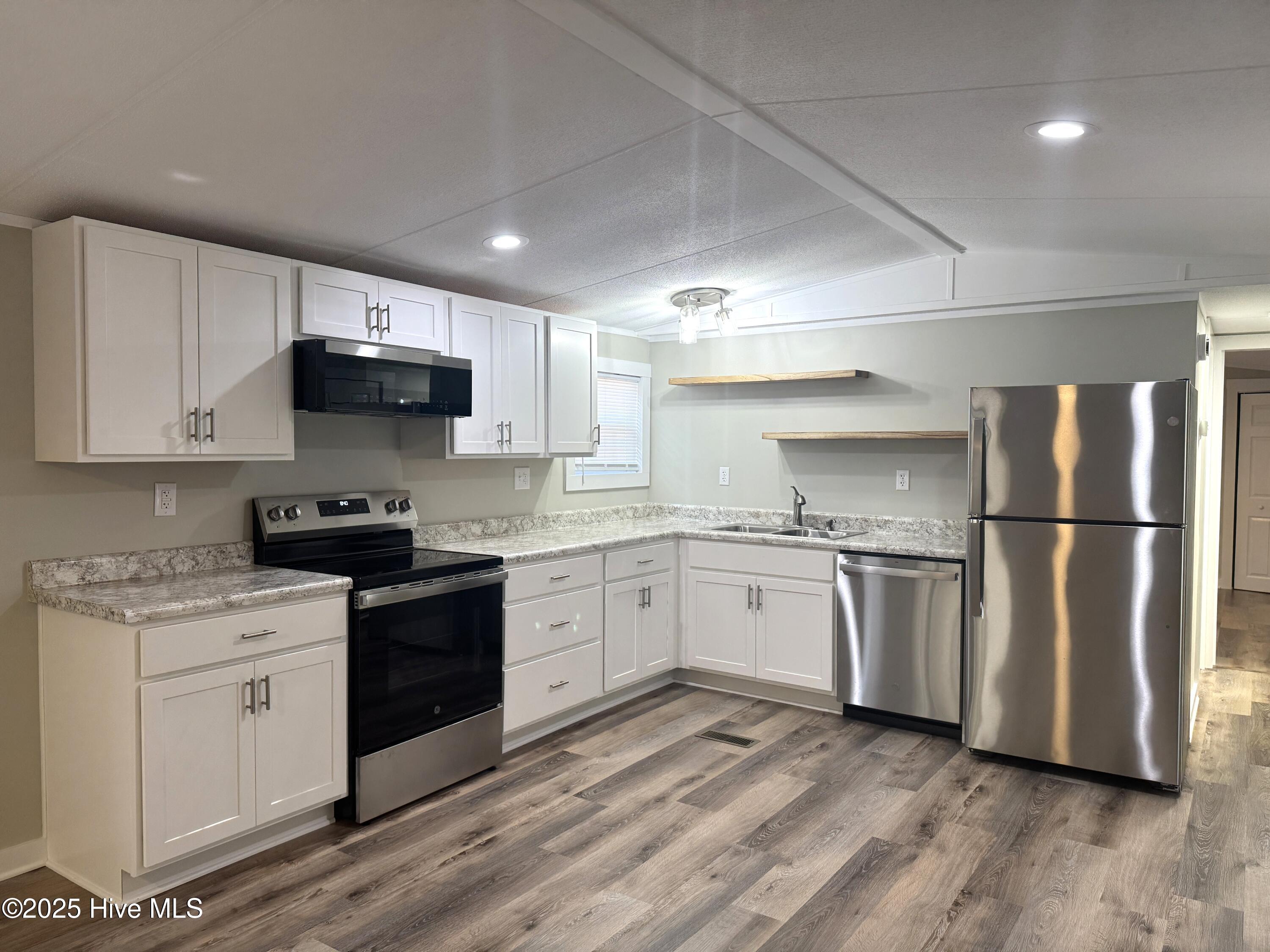 198 Trout Street Holly Ridge, NC 28445 - Photo 5 of 23 20251212_134147561_iOS