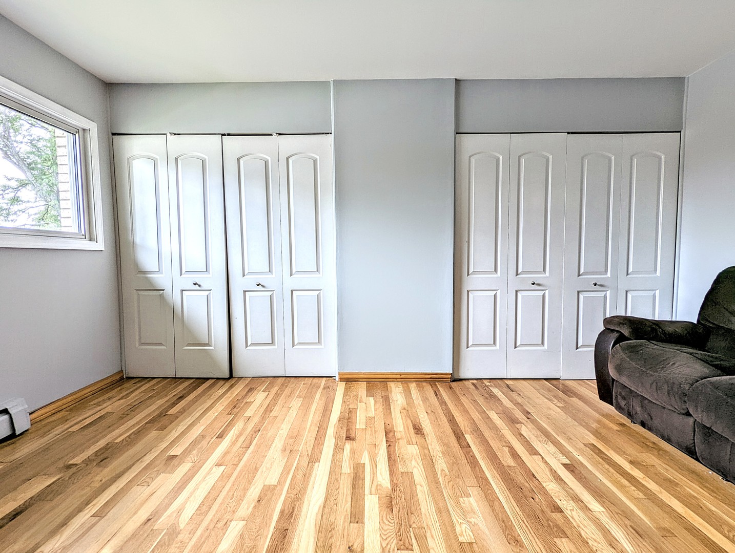9418 Dee Road, Unit 203C Des Plaines, IL 60016 - Photo 11 of 24 a view of wooden floor and in a spacious bedroom