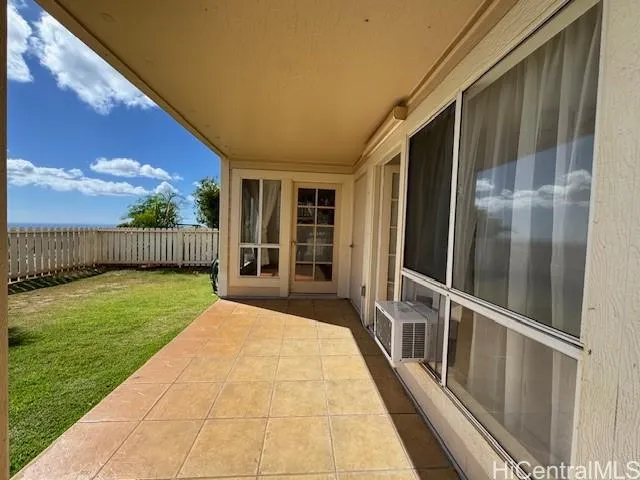 a view of backyard with trampoline