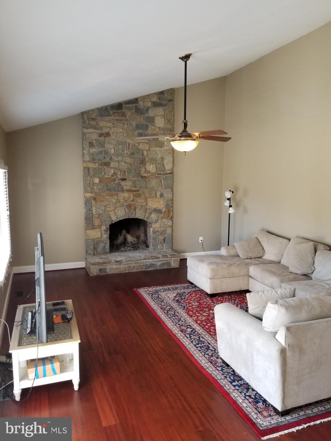 1461 Pleasant Lake Road Annapolis, MD 21409 - Photo 23 of 67 Family Room w/ Distressed Cherry Wood Floors