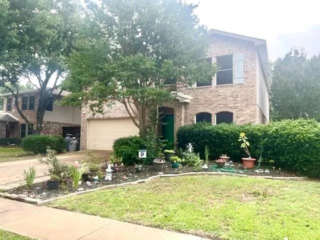 a front view of a house with swimming pool