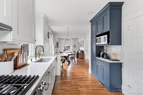 a kitchen with lots of counter top space and a stove