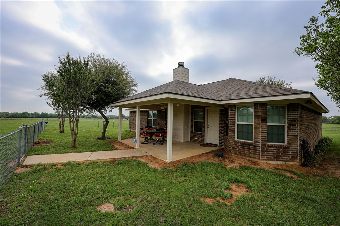 930 County Road 357 Gause, TX 77857 - Photo 12 of 17 a view of a house with a yard and sitting area