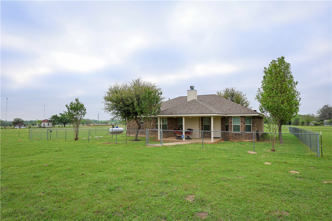 930 County Road 357 Gause, TX 77857 - Photo 13 of 17 a view of a house with a backyard