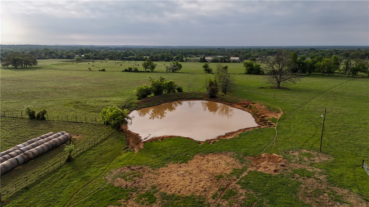 930 County Road 357 Gause, TX 77857 - Photo 16 of 17 an aerial view of a golf course with chairs