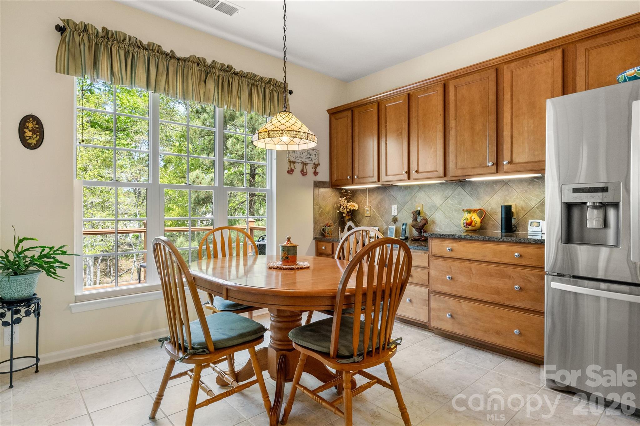 27064 Sanderling Court Fort Mill, SC 29707 - Photo 11 of 48 a view of a dining room with furniture window and outside view