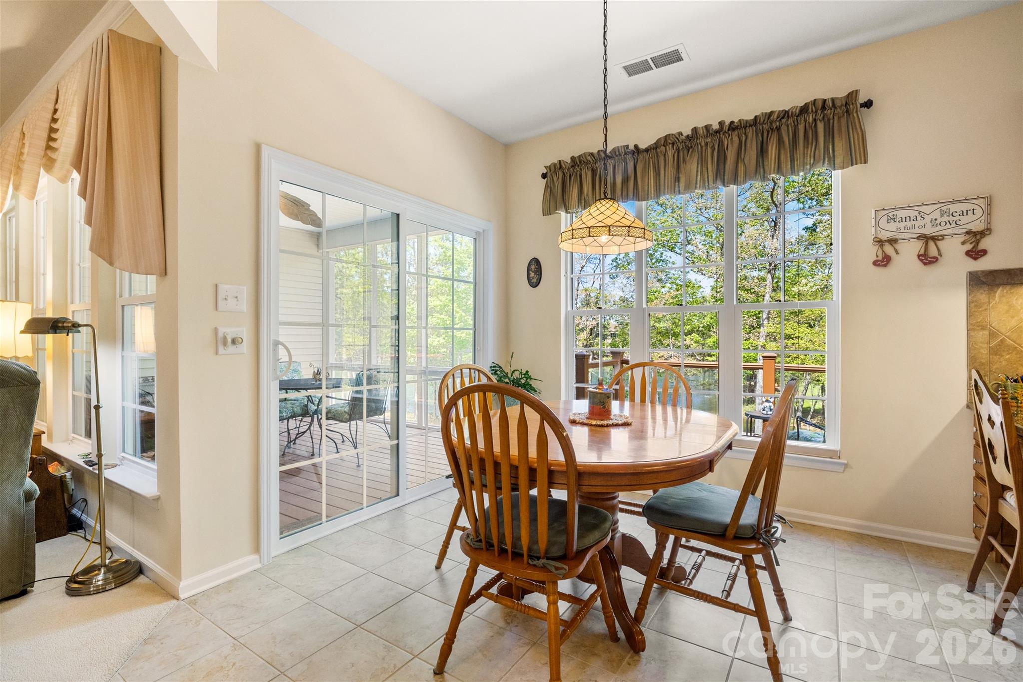 27064 Sanderling Court Fort Mill, SC 29707 - Photo 12 of 48 a view of a dining room with furniture window and outside view