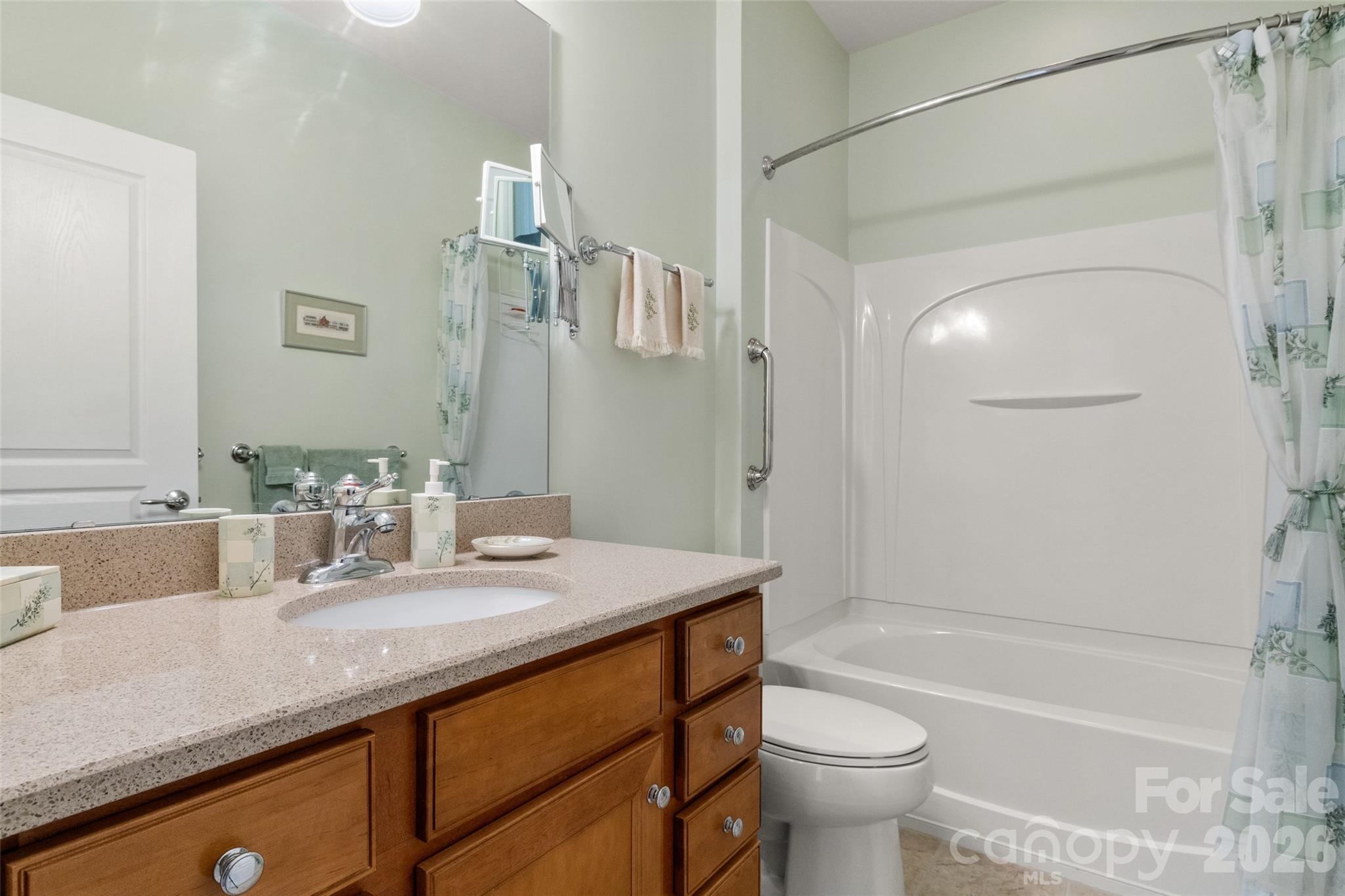 27064 Sanderling Court Fort Mill, SC 29707 - Photo 23 of 48 a bathroom with a granite countertop sink toilet and shower