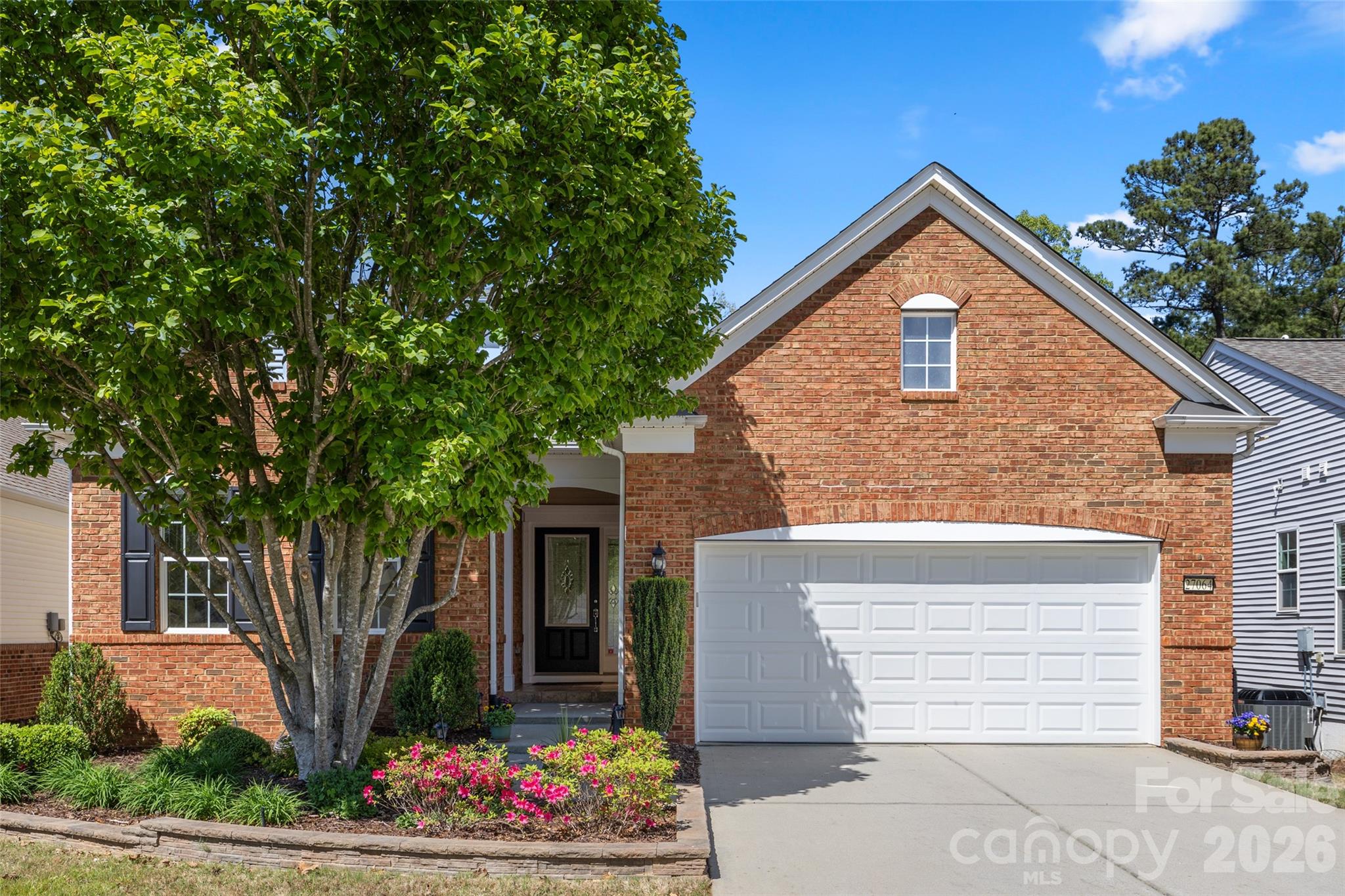 27064 Sanderling Court Fort Mill, SC 29707 - Photo 40 of 48 a front view of a house with garden