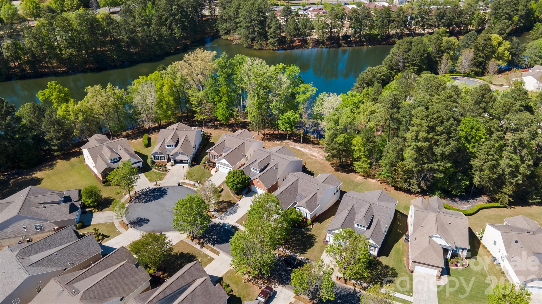 27064 Sanderling Court Fort Mill, SC 29707 - Photo 4 of 48 an aerial view of house with yard and lake view