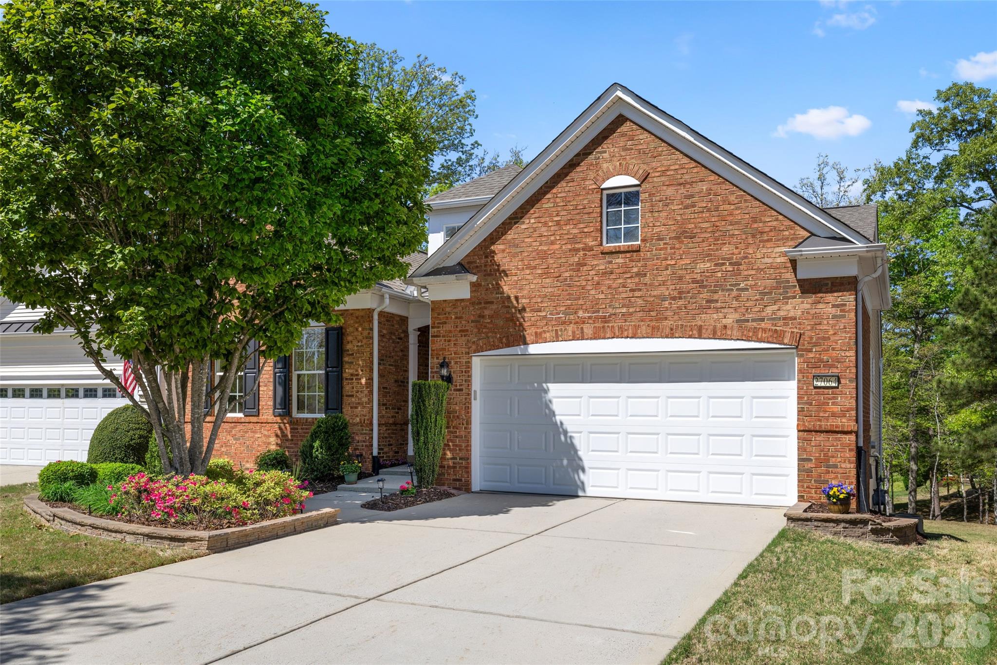 27064 Sanderling Court Fort Mill, SC 29707 - Photo 41 of 48 a front view of a house with a yard and garage