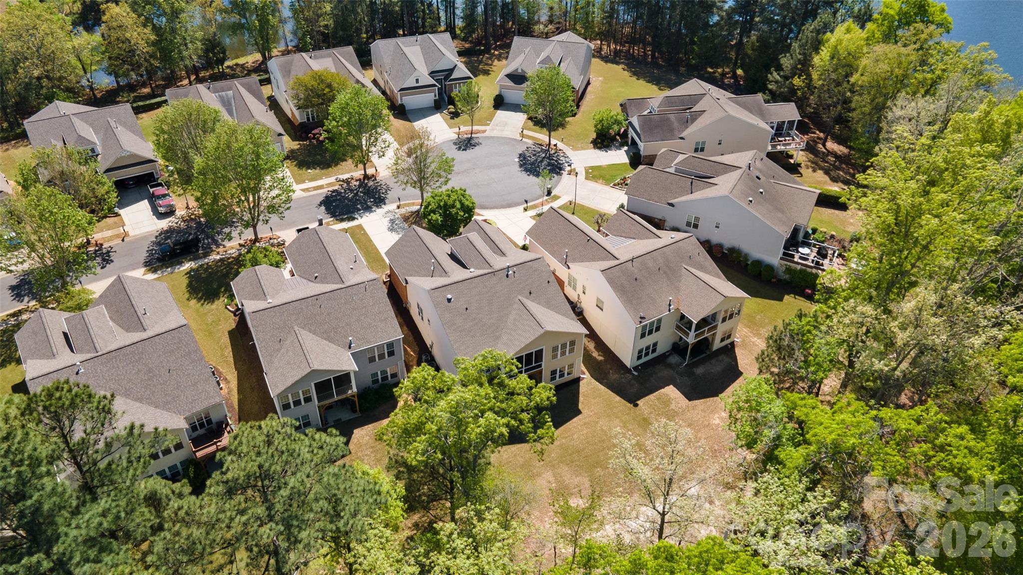 27064 Sanderling Court Fort Mill, SC 29707 - Photo 42 of 48 an aerial view of a house with a yard and lake view