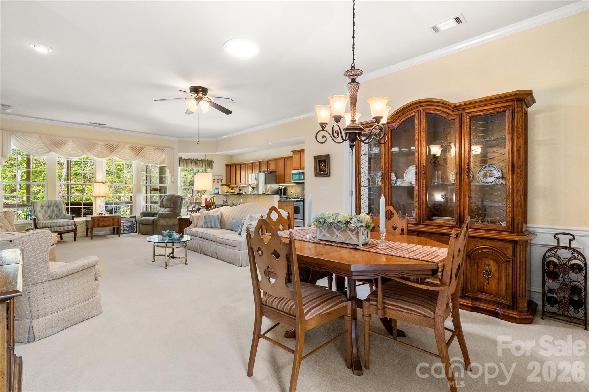 27064 Sanderling Court Fort Mill, SC 29707 - Photo 6 of 48 a view of a dining room with furniture and chandelier