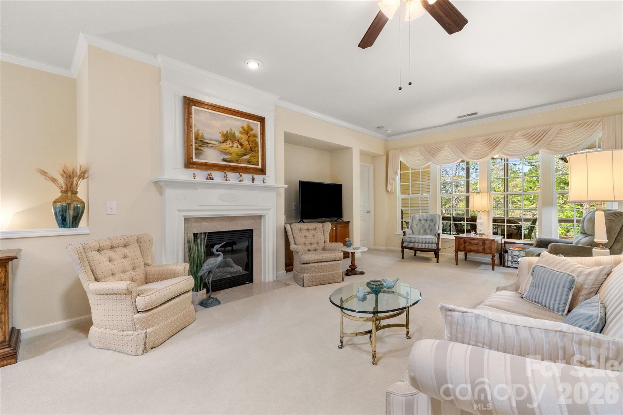 27064 Sanderling Court Fort Mill, SC 29707 - Photo 7 of 48 a living room with furniture fireplace and window