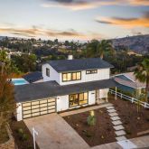 a view of a city with a houses