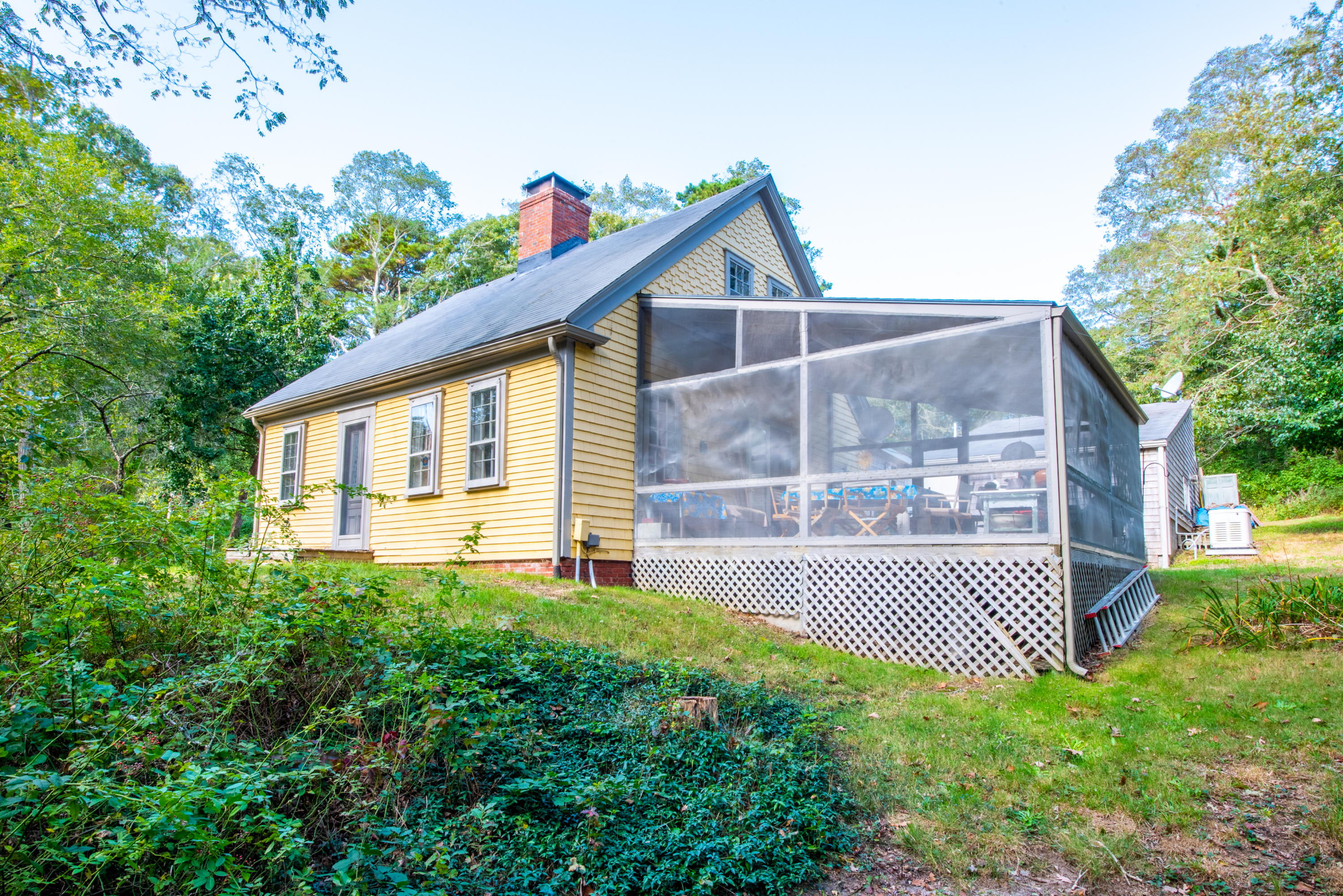 378 Pamet Point Road Wellfleet, MA 02667 - Photo 3 of 35 a view of a house with a yard