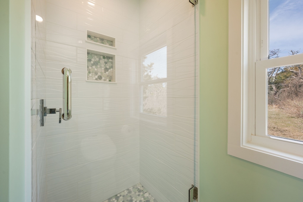 315 R Nauset Light Beach Road Eastham, MA 02642 - Photo 12 of 28 a bathroom with a shower