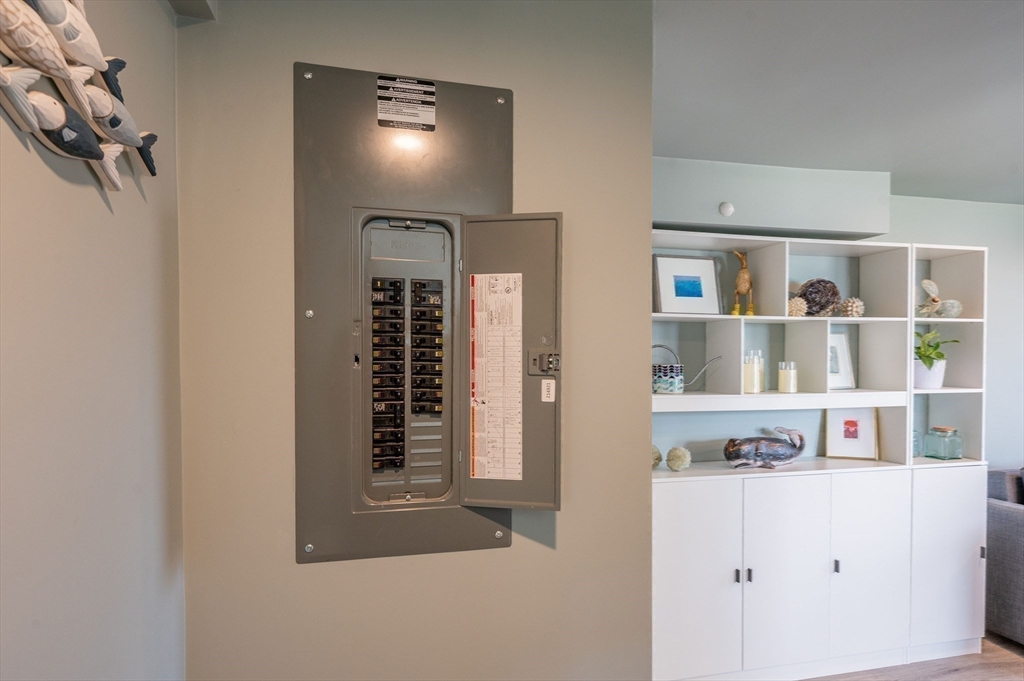 315 R Nauset Light Beach Road Eastham, MA 02642 - Photo 20 of 28 a view of kitchen cabinets and window