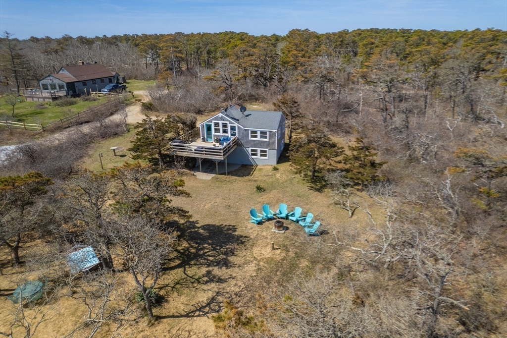 315 R Nauset Light Beach Road Eastham, MA 02642 - Photo 23 of 28 an aerial view of a house with a yard