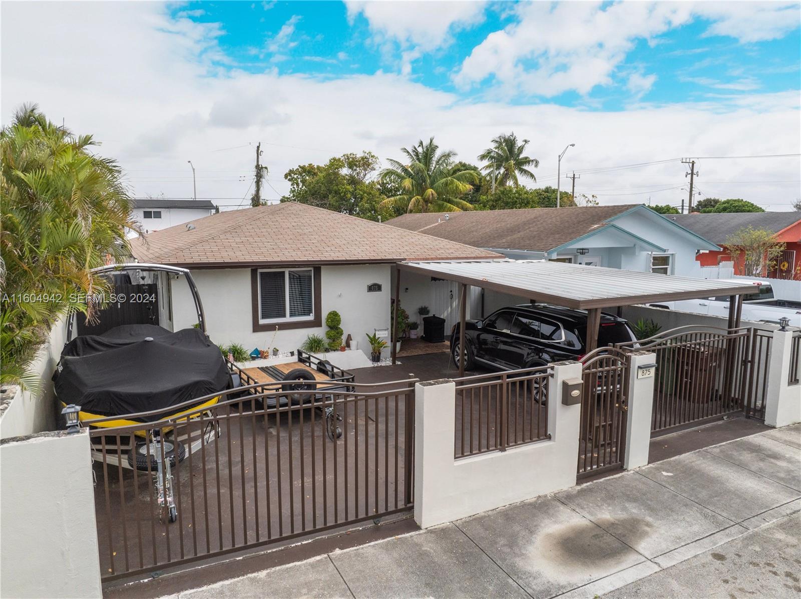 875 East 29th Street Hialeah, FL 33013 - Photo 15 of 38 a view of a patio and outdoor seating