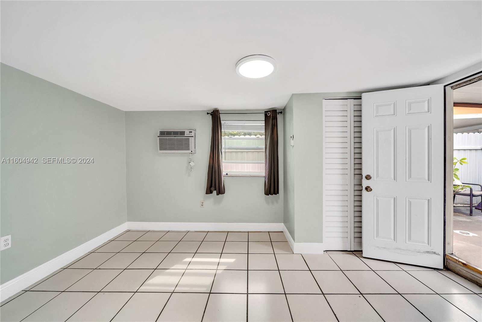 875 East 29th Street Hialeah, FL 33013 - Photo 23 of 38 a view of an empty room