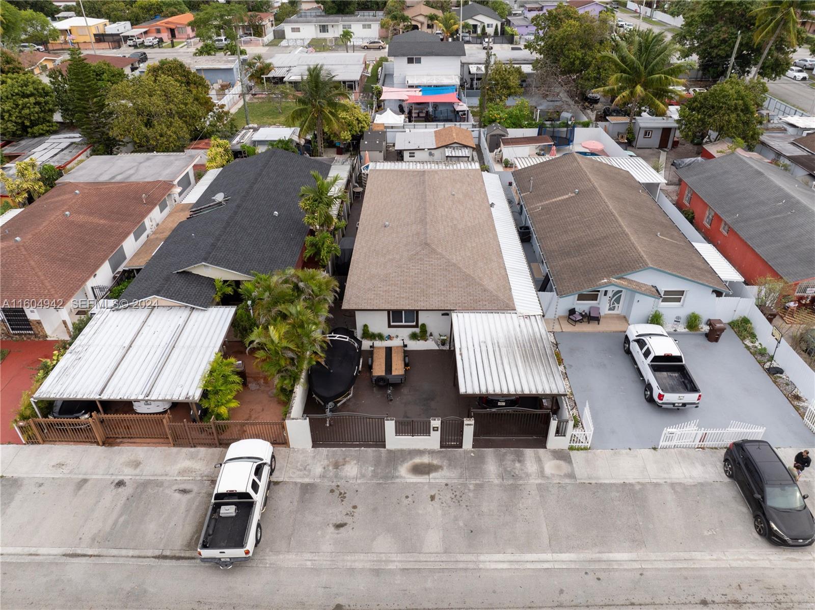 875 East 29th Street Hialeah, FL 33013 - Photo 29 of 38 an aerial view of residential houses with outdoor space