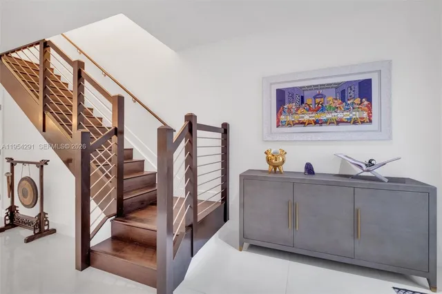 a view of entryway with workspace and window