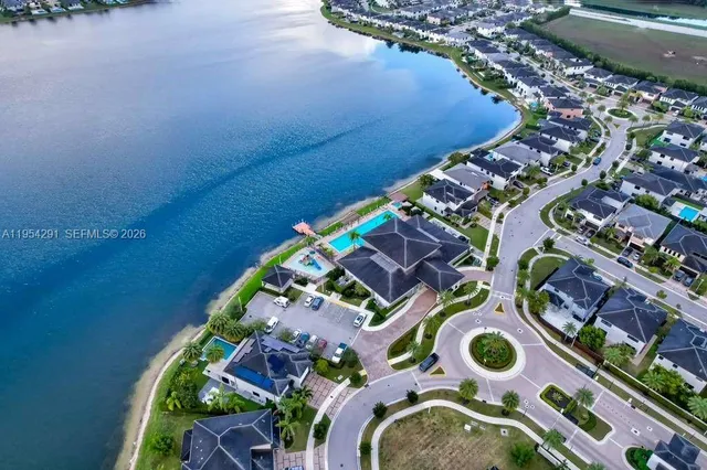 an aerial view of a house swimming pool and outdoor space