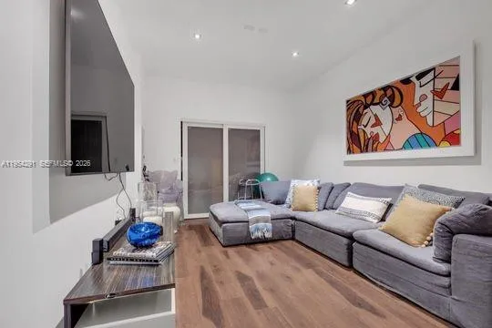 a living room with furniture and a couch