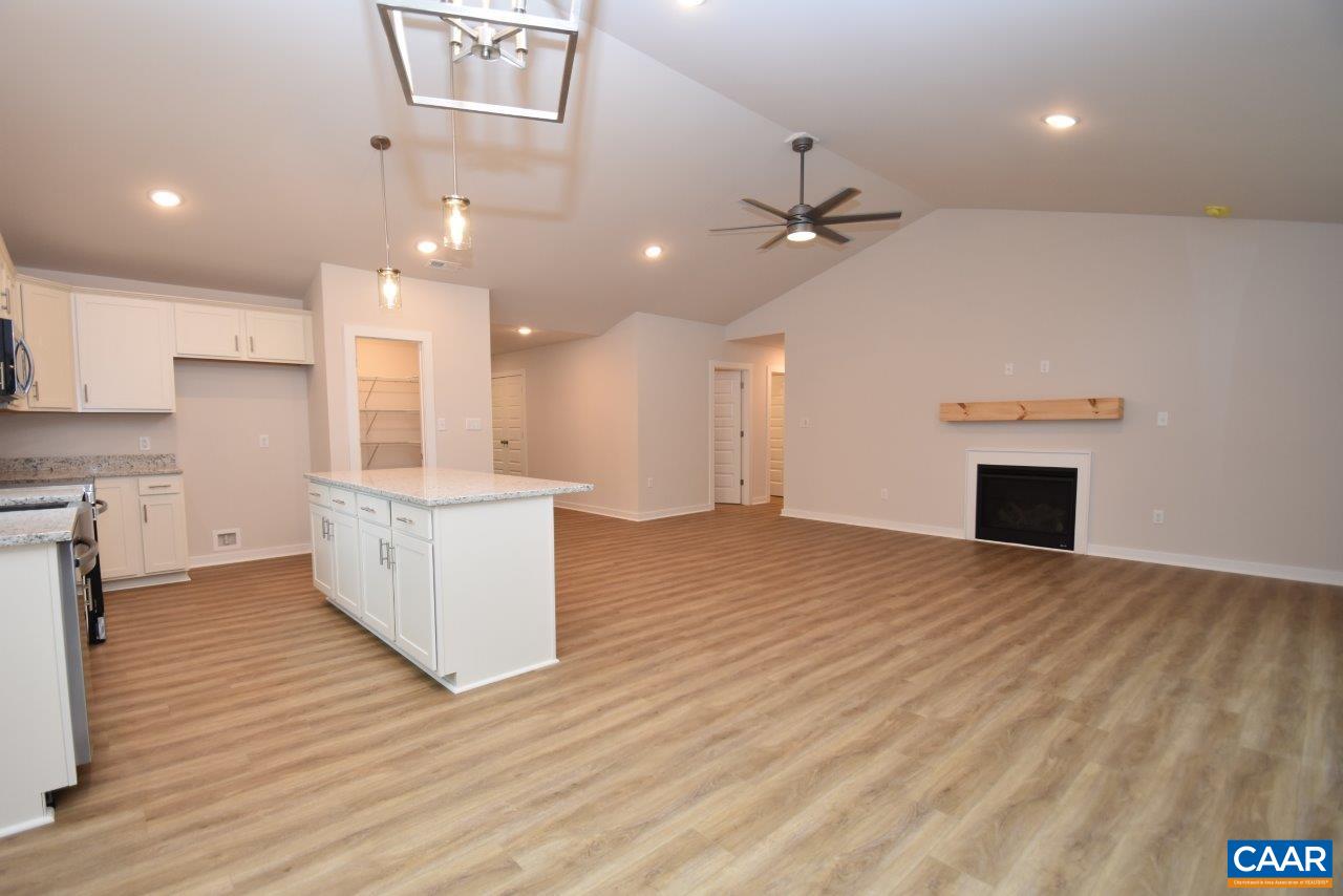 88 Martin Village Road, Unit MV 16D Louisa, VA 23093 - Photo 16 of 37 a view of kitchen and hall with wooden floor