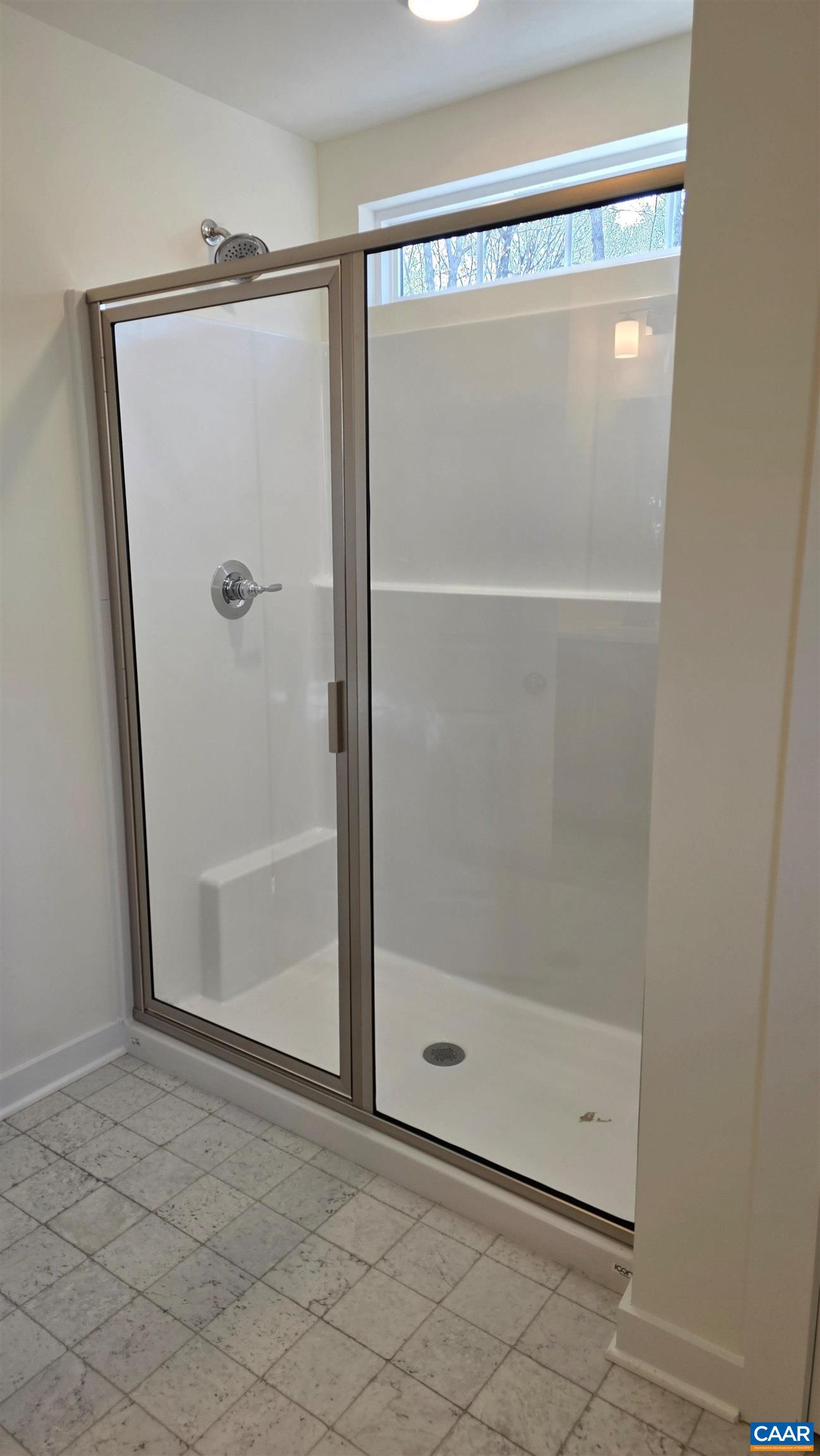 88 Martin Village Road, Unit MV 16D Louisa, VA 23093 - Photo 19 of 41 a bathroom with a glass shower door