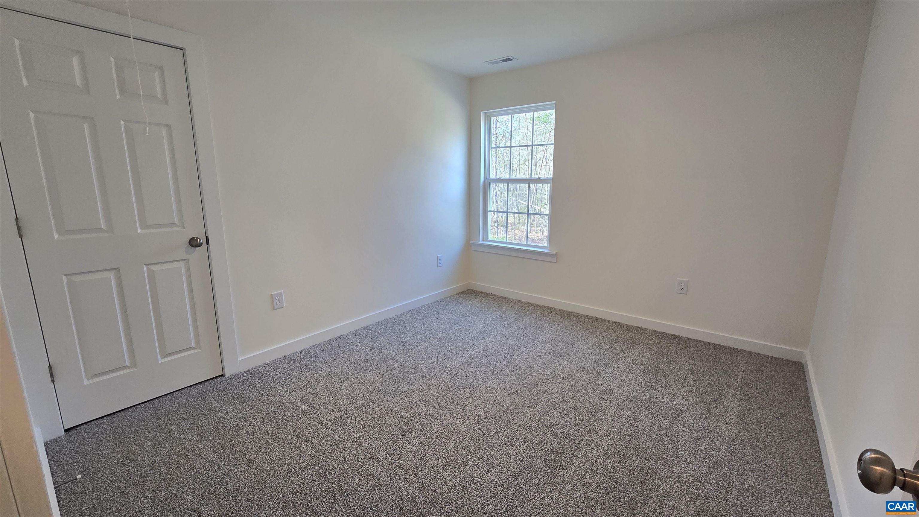 88 Martin Village Road, Unit MV 16D Louisa, VA 23093 - Photo 21 of 41 a view of an empty room with a window
