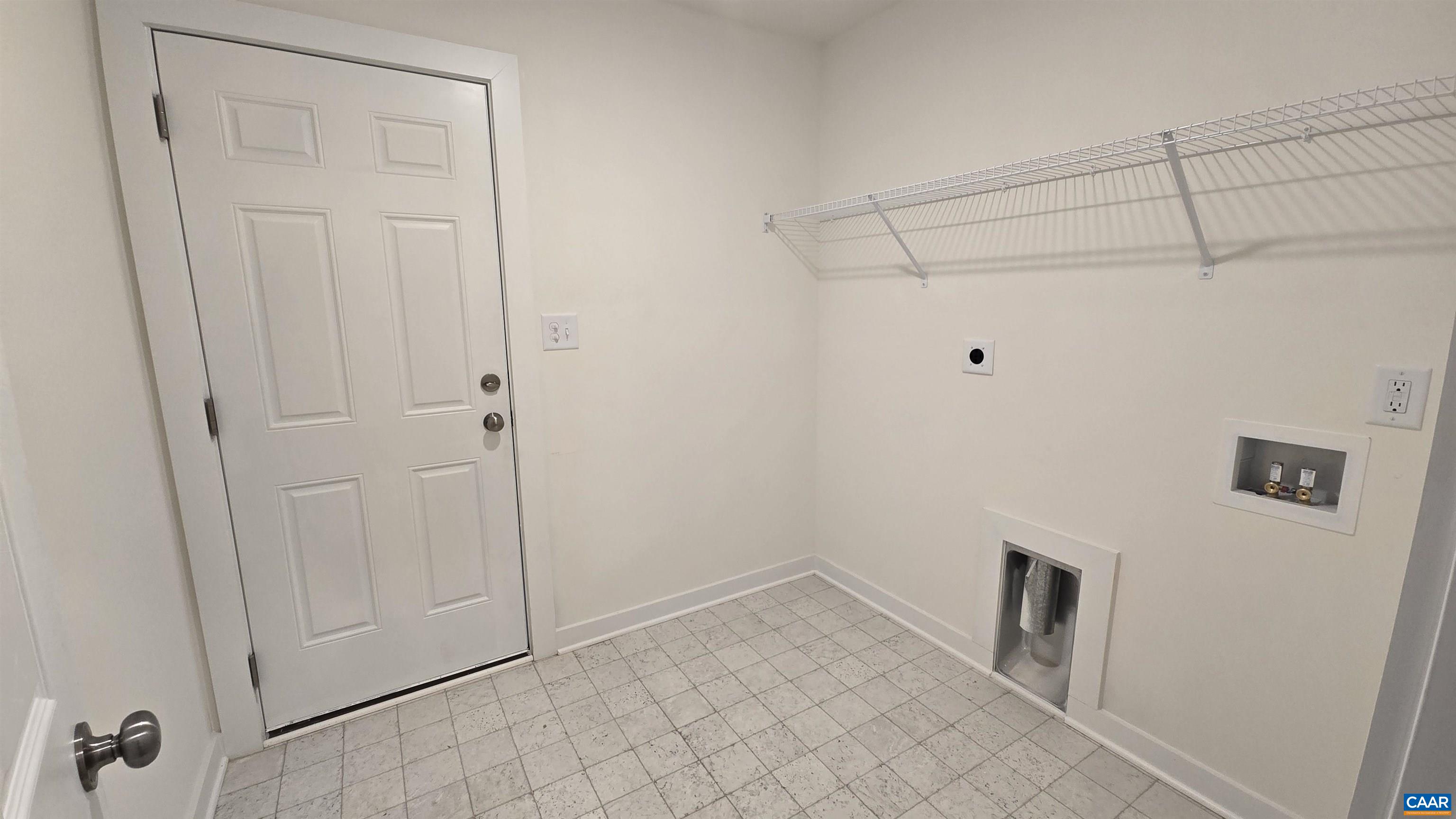 88 Martin Village Road, Unit MV 16D Louisa, VA 23093 - Photo 24 of 41 a view of a closet area with hardwood floor