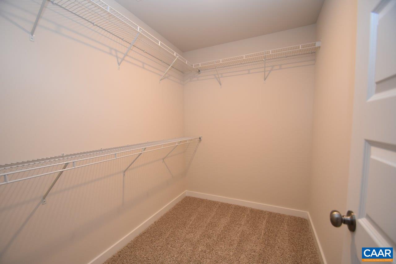 88 Martin Village Road, Unit MV 16D Louisa, VA 23093 - Photo 24 of 37 a view of a room with racks on the wall