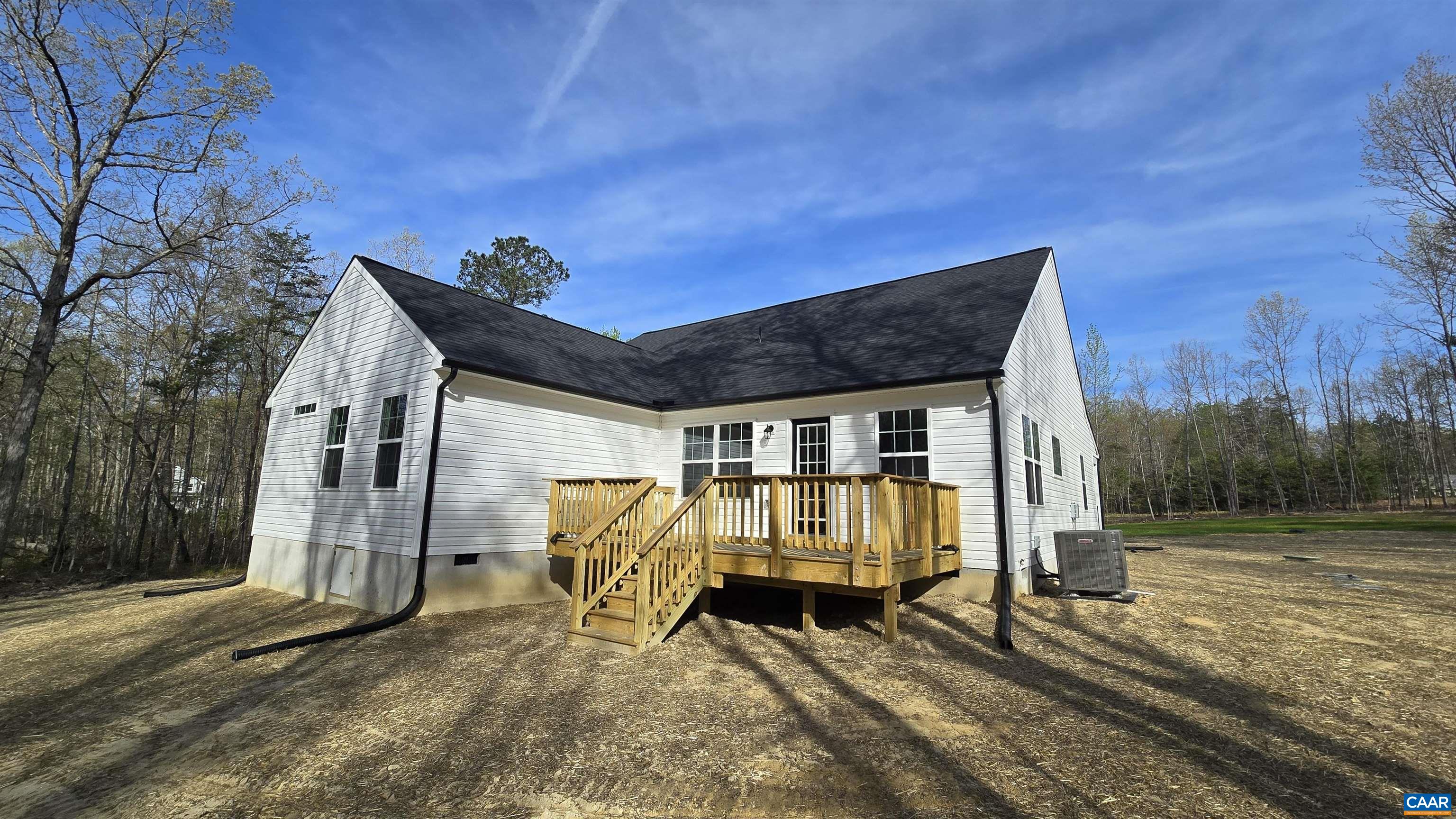 88 Martin Village Road, Unit MV 16D Louisa, VA 23093 - Photo 29 of 41 a view of a house with backyard and deck