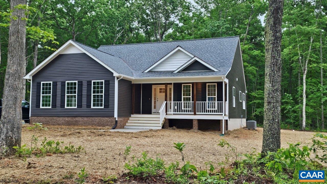 88 Martin Village Road, Unit MV 16D Louisa, VA 23093 - Photo 3 of 37 a front view of a house with garden