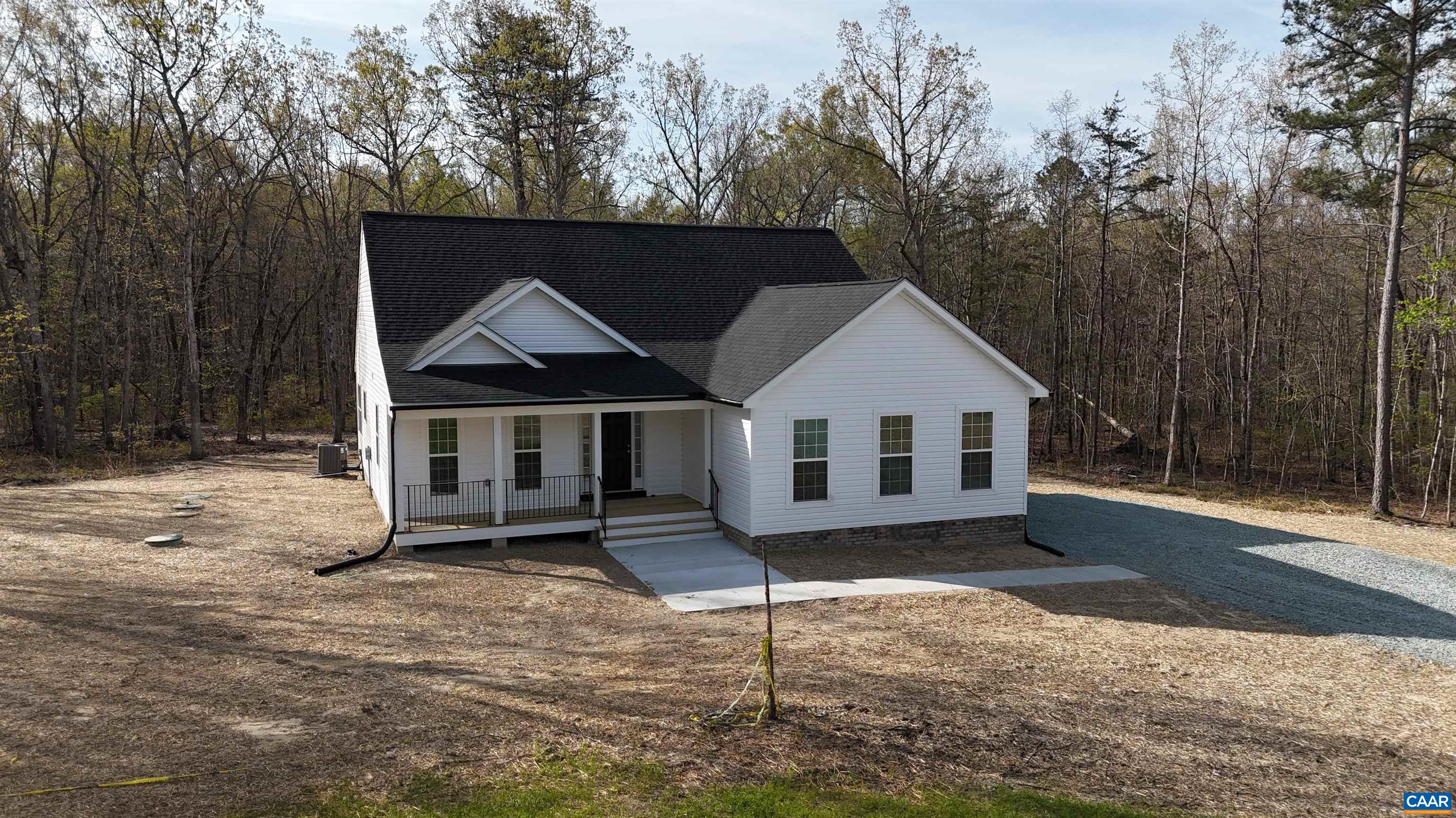 88 Martin Village Road, Unit MV 16D Louisa, VA 23093 - Photo 33 of 41 a house with trees in the background