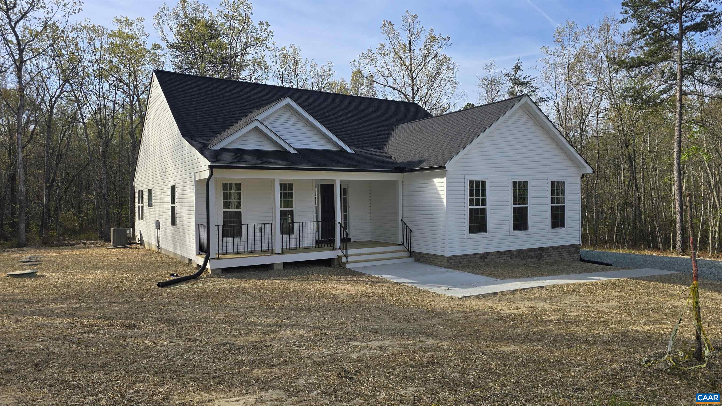 88 Martin Village Road, Unit MV 16D Louisa, VA 23093 - Photo 34 of 41 a view of a house with a yard