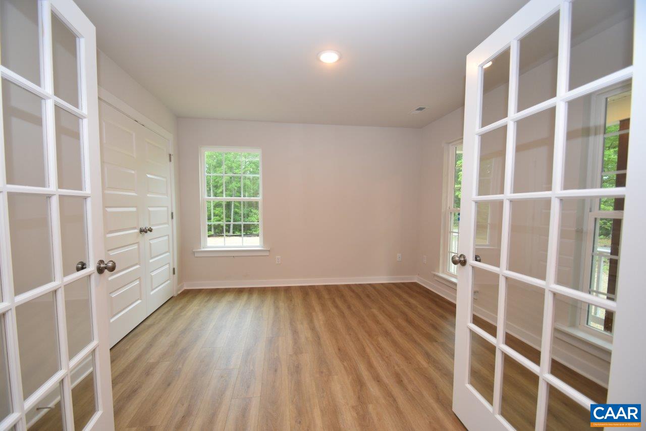 88 Martin Village Road, Unit MV 16D Louisa, VA 23093 - Photo 4 of 37 an empty room with windows