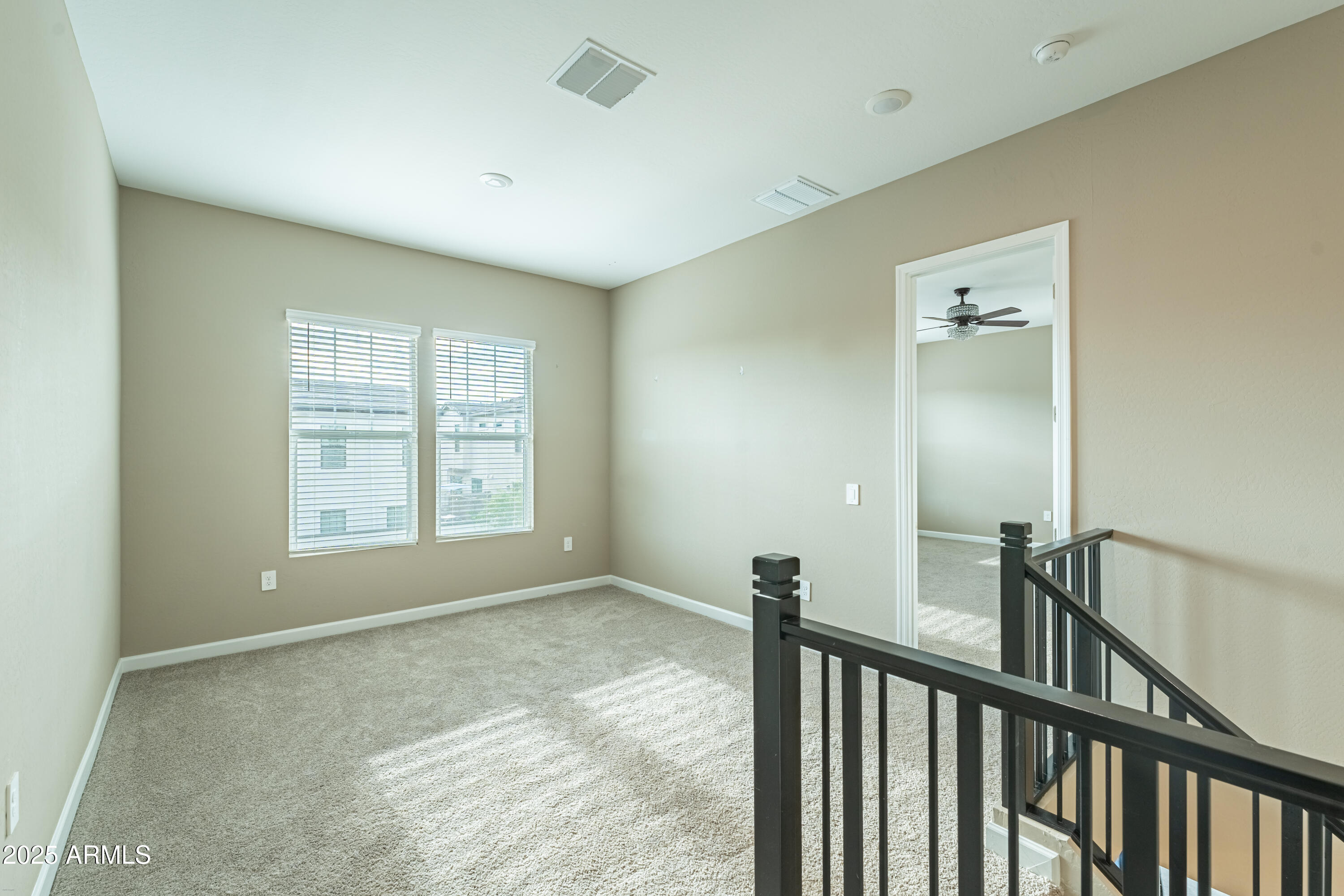 4838 East Helena Drive Scottsdale, AZ 85254 - Photo 14 of 32 a view of an empty room with a window