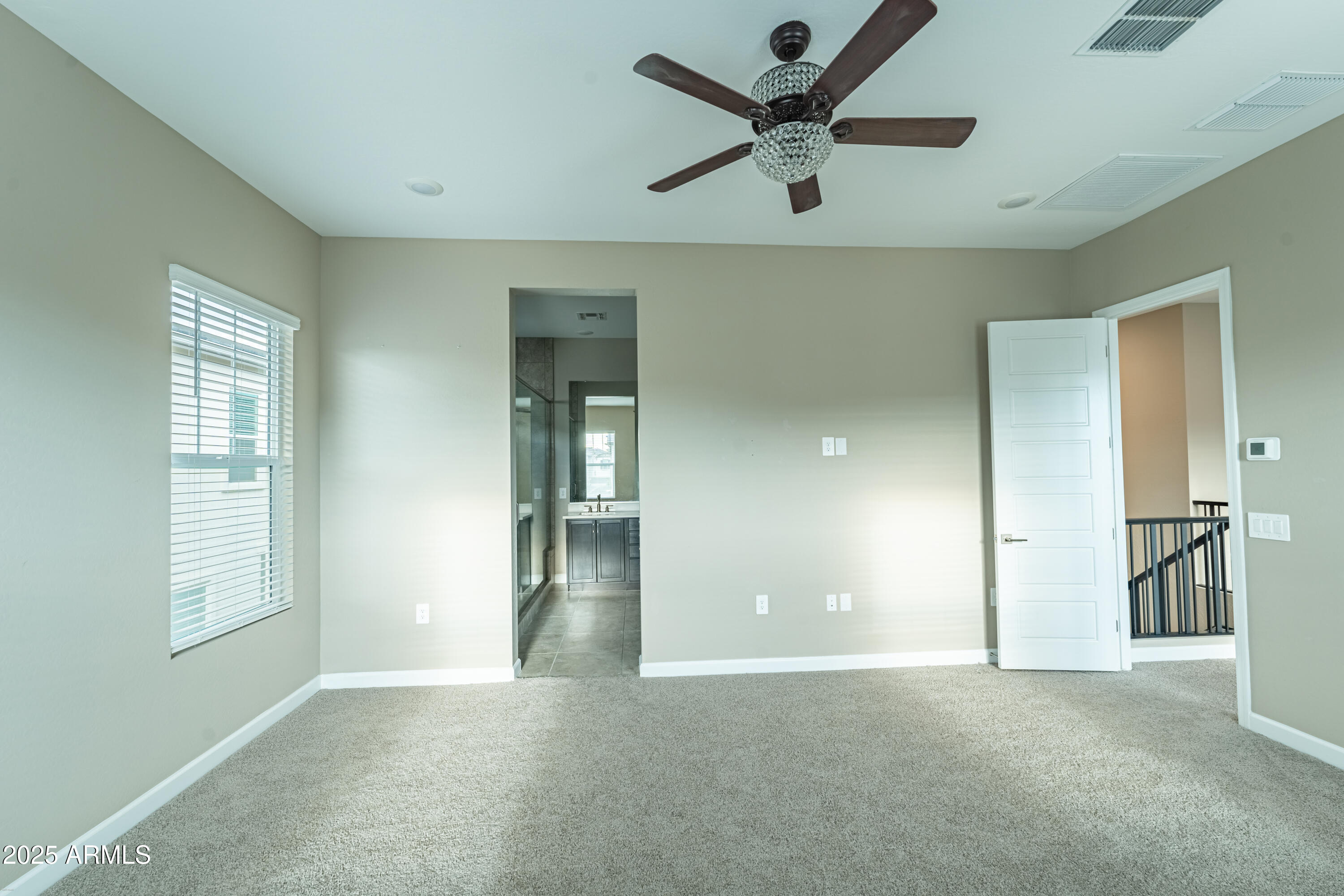 4838 East Helena Drive Scottsdale, AZ 85254 - Photo 16 of 32 a view of a livingroom with a ceiling fan and window