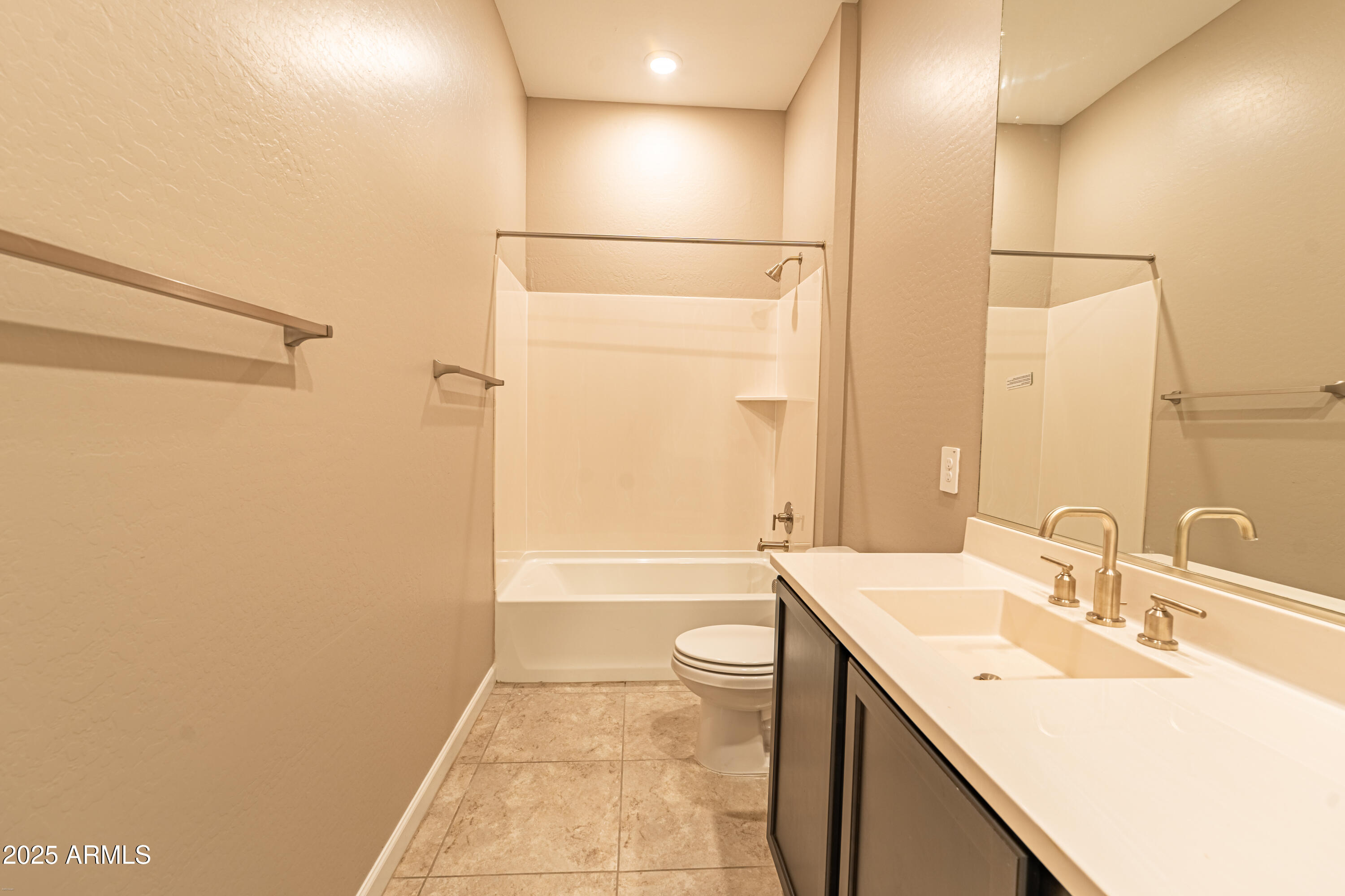 4838 East Helena Drive Scottsdale, AZ 85254 - Photo 22 of 32 a bathroom with a sink a toilet and shower