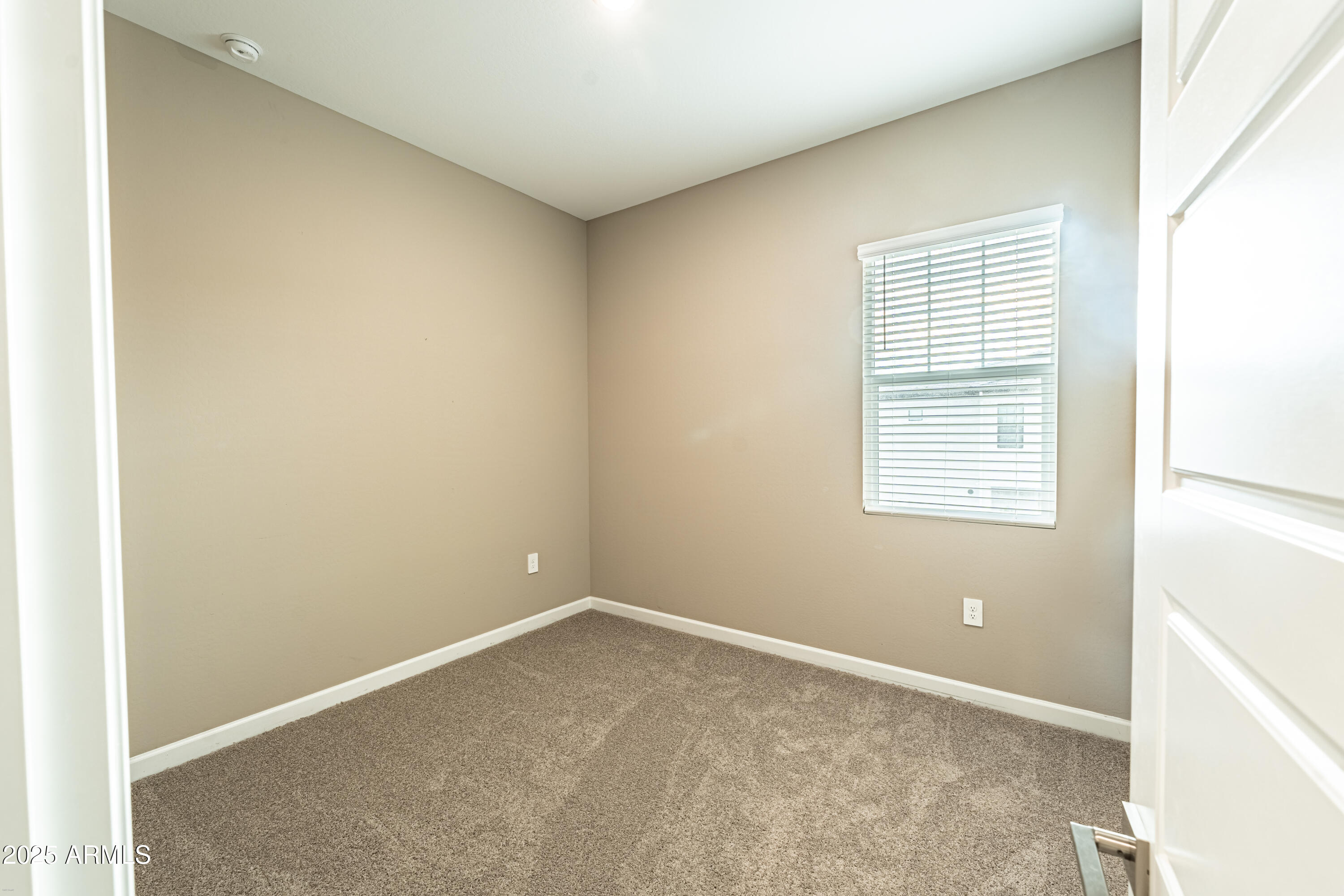 4838 East Helena Drive Scottsdale, AZ 85254 - Photo 24 of 32 a view of an empty room with a window