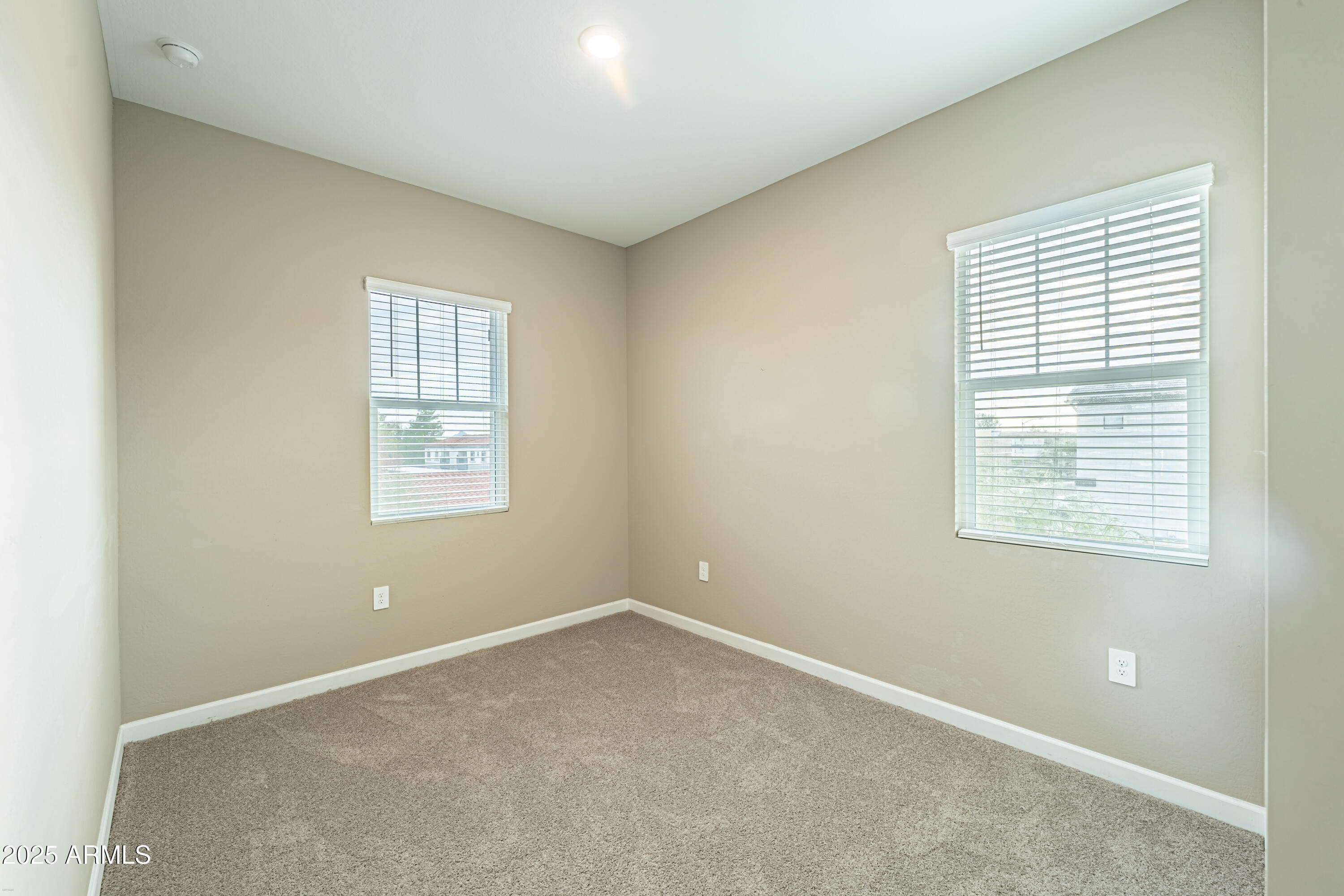 4838 East Helena Drive Scottsdale, AZ 85254 - Photo 26 of 32 an empty room with a window